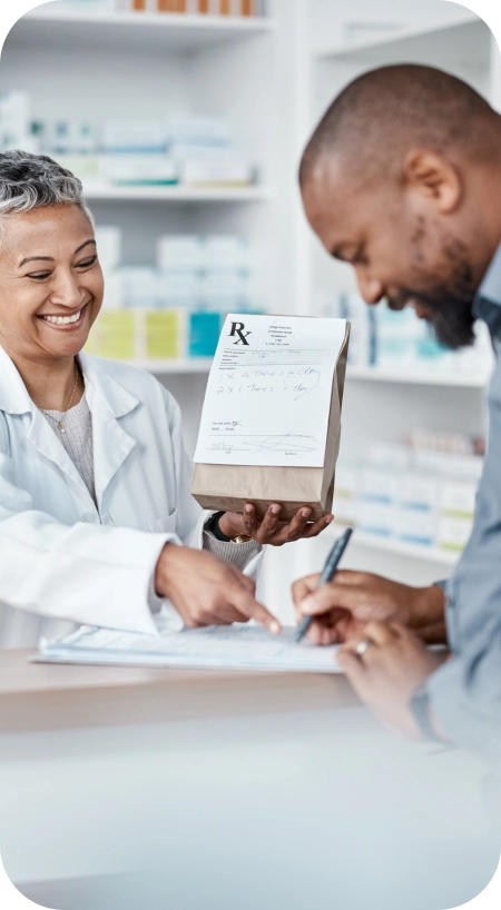 pharmacist and customer smiling together
