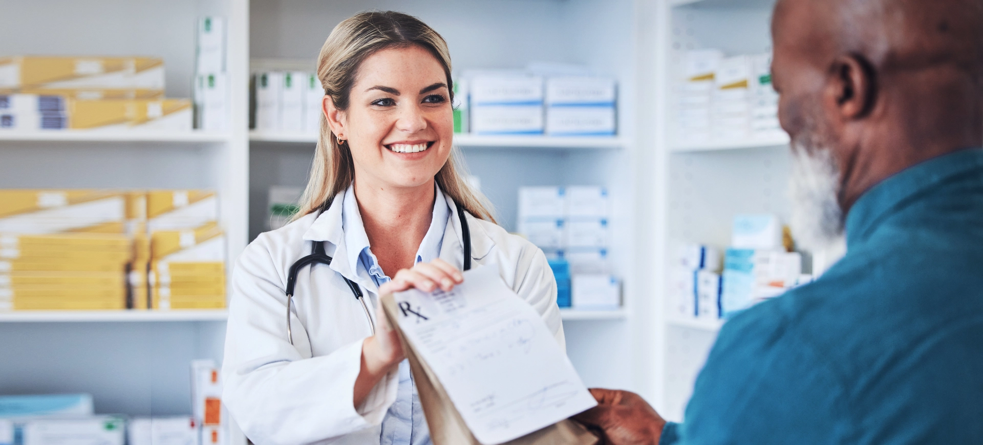 female pharmacist smiling at the customer