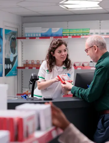 Pharmacist Serving a Customer