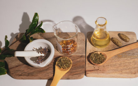Herbal ingredients on wooden boards.